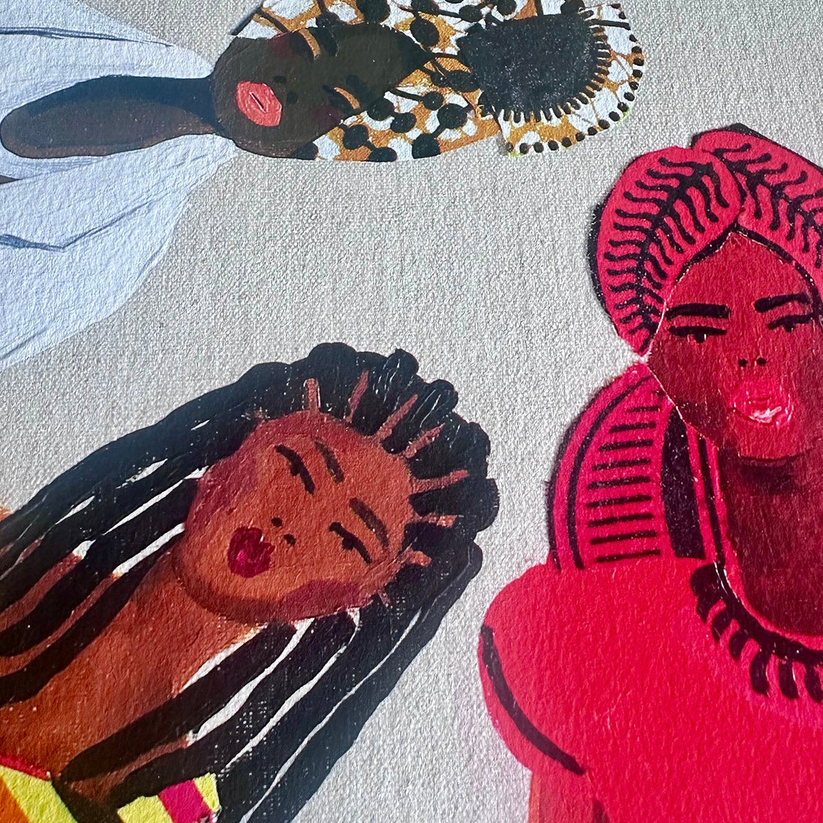 A close-up of a textured print of a painting  depicting three Black women. The woman on the right wears a bright red top and headwrap, while the woman in the middle has black braids and a colorful striped garment, the woman on the left has a white top and a white and beige headwrap.